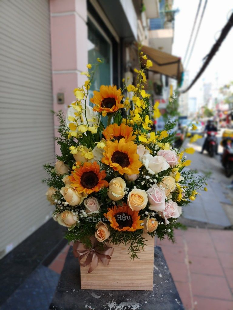 16f3c40aae2721ef13cd3ecb7baeabd8 Hộp hoa hướng dương
